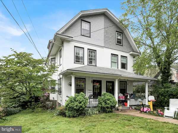 a front view of a house with porch