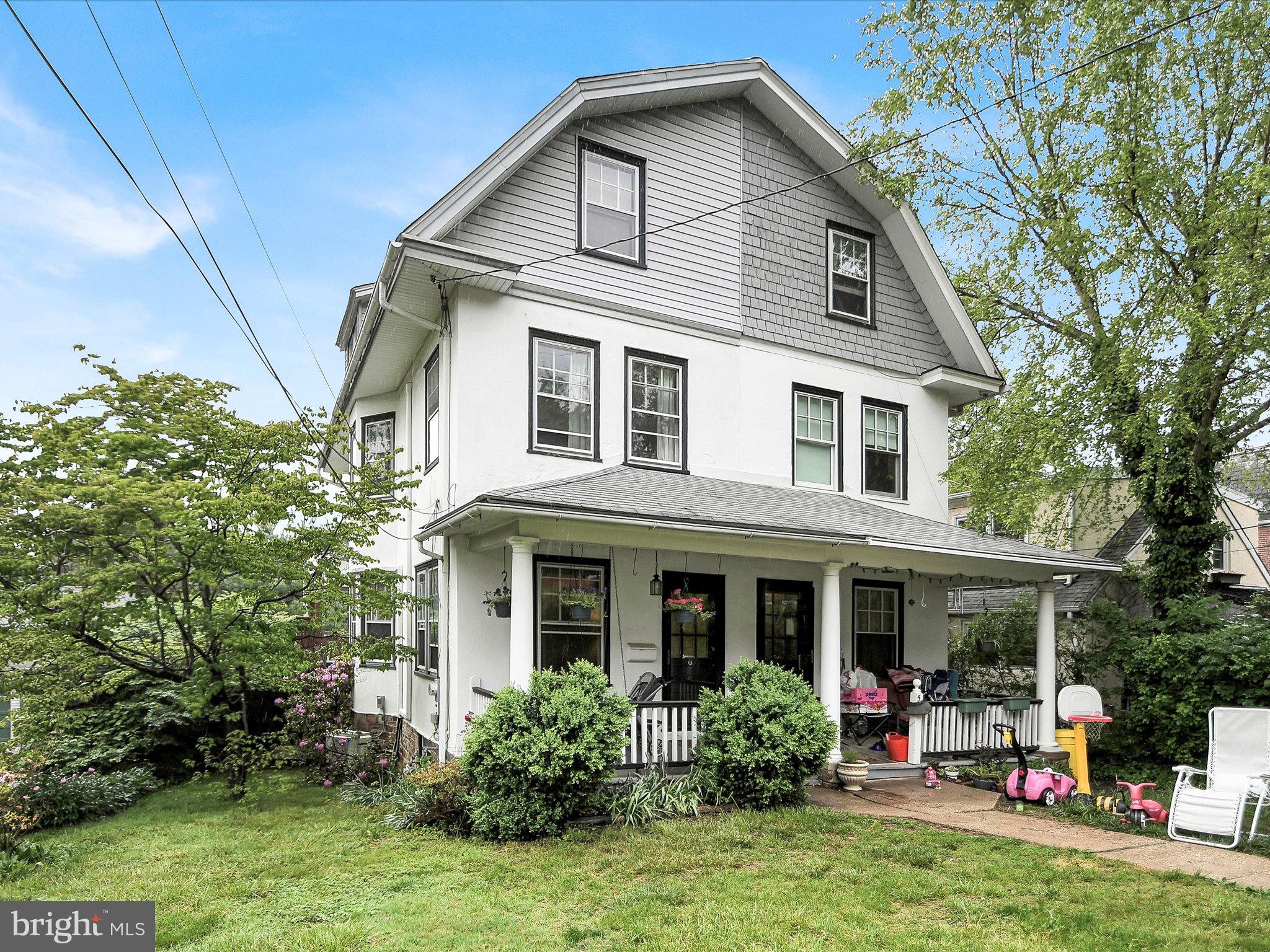 3 Bells Mill Road Glenside, PA 19038 - Photo 3 of 38 a front view of a house with porch