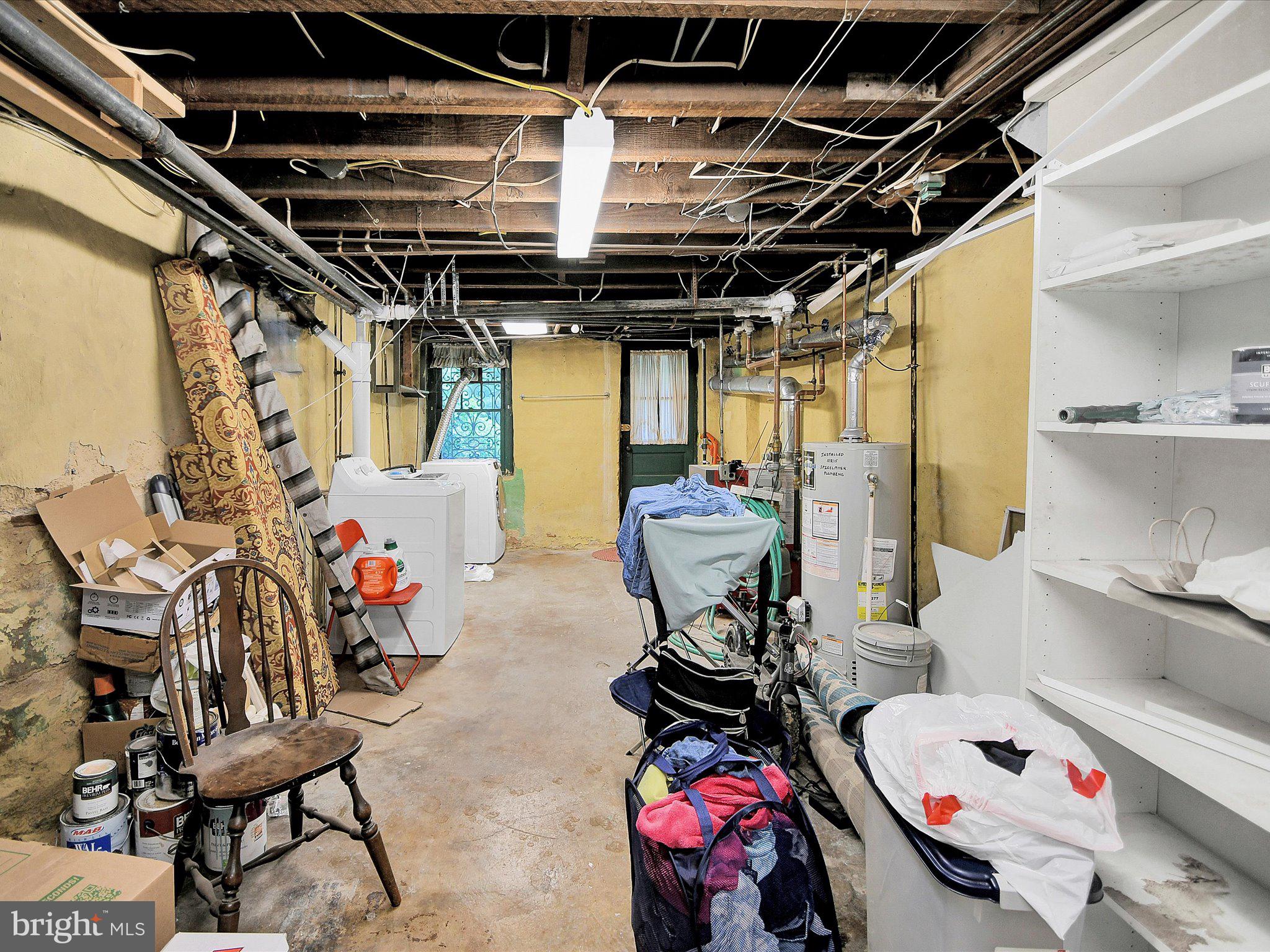3 Bells Mill Road Glenside, PA 19038 - Photo 31 of 38 a view of a storage room with washer and dryer