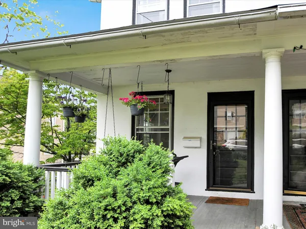 a front view of a house with a porch