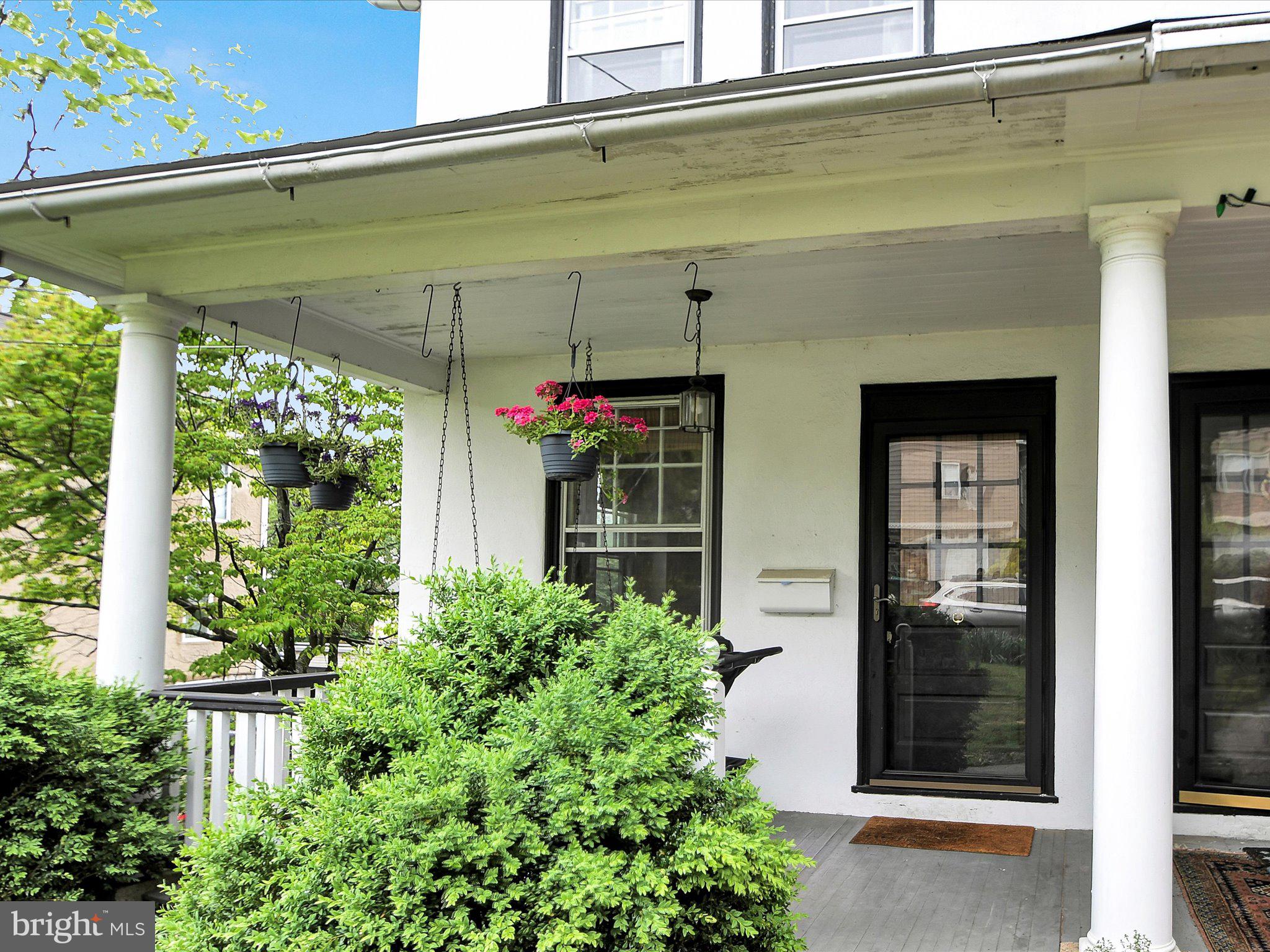 3 Bells Mill Road Glenside, PA 19038 - Photo 5 of 38 a front view of a house with a porch