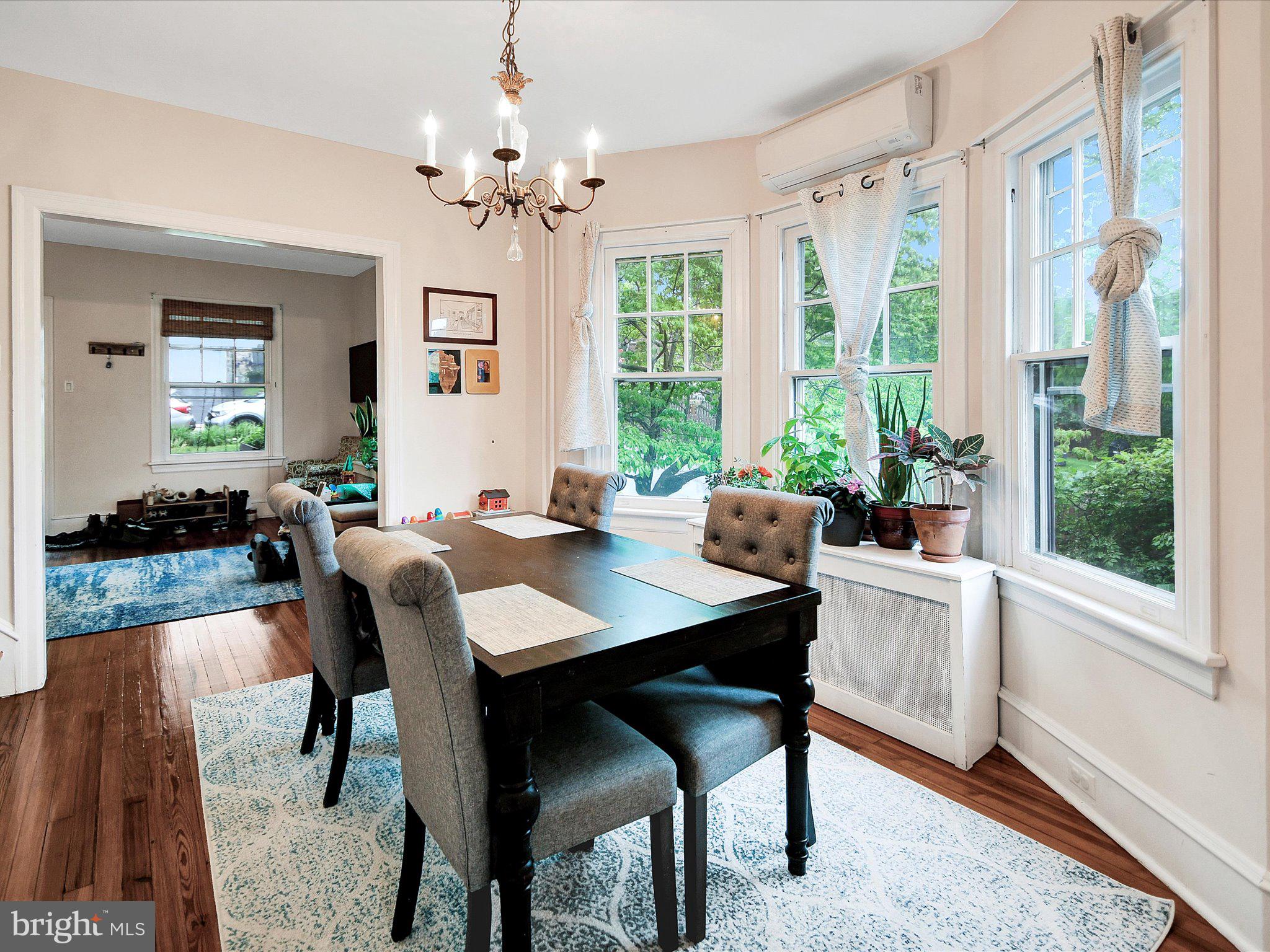 3 Bells Mill Road Glenside, PA 19038 - Photo 9 of 38 a view of a dining room with furniture a chandelier and wooden floor