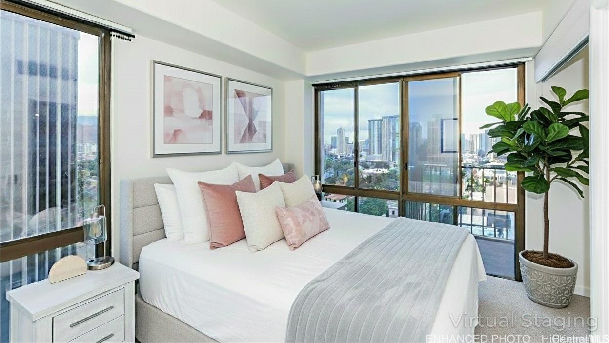 225 Queen Street, Unit 21H Honolulu, HI 96813 - Photo 10 of 25 Enhanced photo. Primary has views from bed of ocean, Ward Village & City lights with window for cross Hawaiian Tradewind breezes.