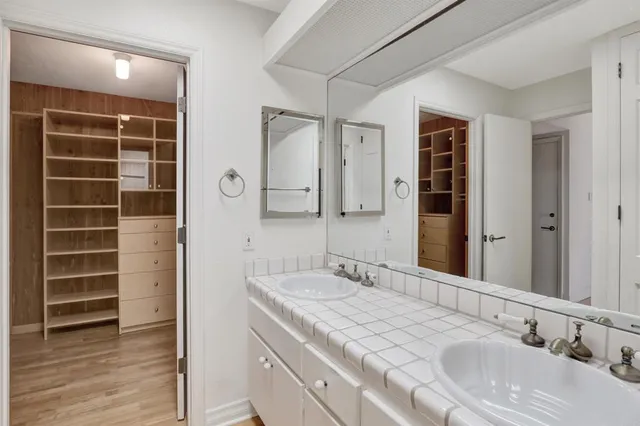 a view of a garden with houses