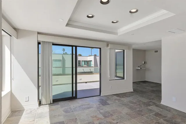 a view of an empty room and window