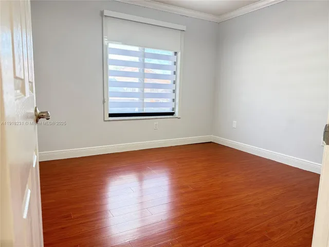 a bathroom with a shower and toilet