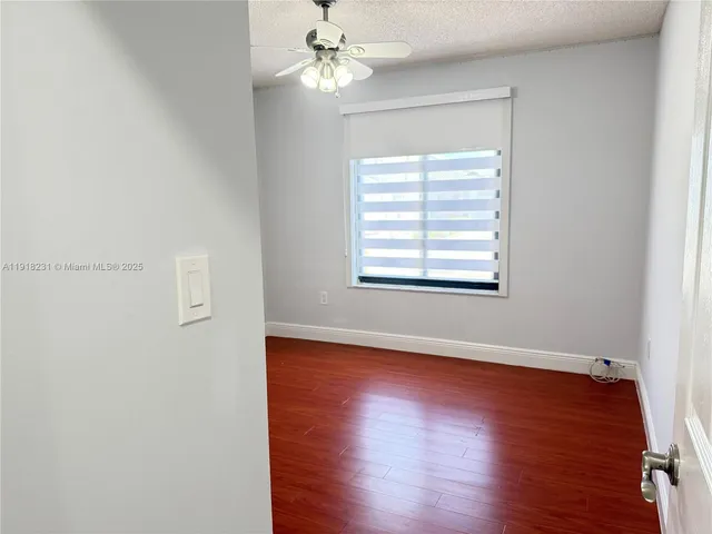 a view of a livingroom and a bathroom
