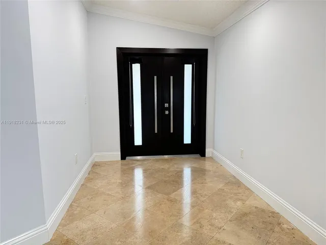 a kitchen with stainless steel appliances a refrigerator sink and microwave