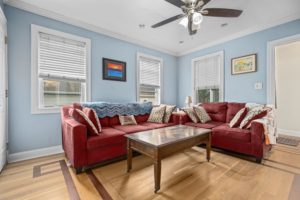 145 High Street, Unit 2 Danvers, MA 01923 - Photo 1 of 40 a living room with furniture and a window
