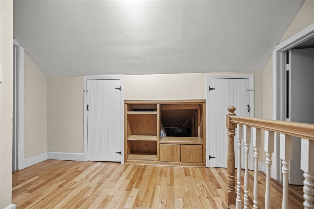 145 High Street, Unit 2 Danvers, MA 01923 - Photo 27 of 40 a view of a livingroom with wooden floor