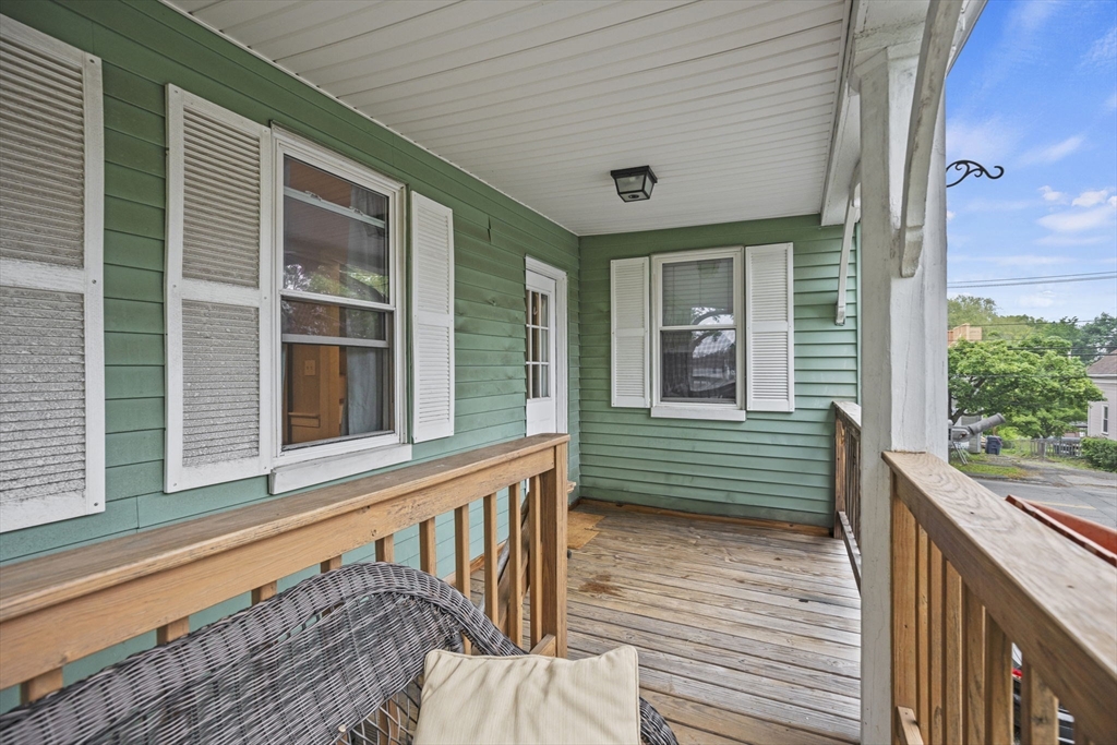 145 High Street, Unit 2 Danvers, MA 01923 - Photo 29 of 40 a view of a two chairs in the balcony