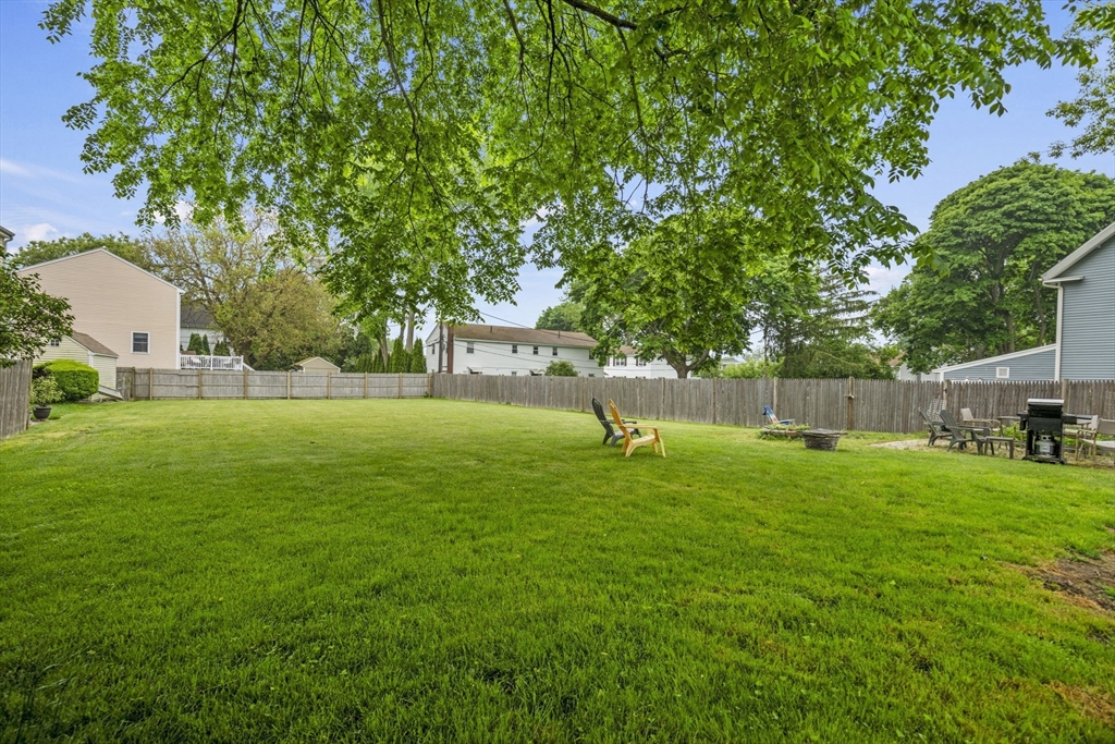 145 High Street, Unit 2 Danvers, MA 01923 - Photo 32 of 40 a house view with a garden space
