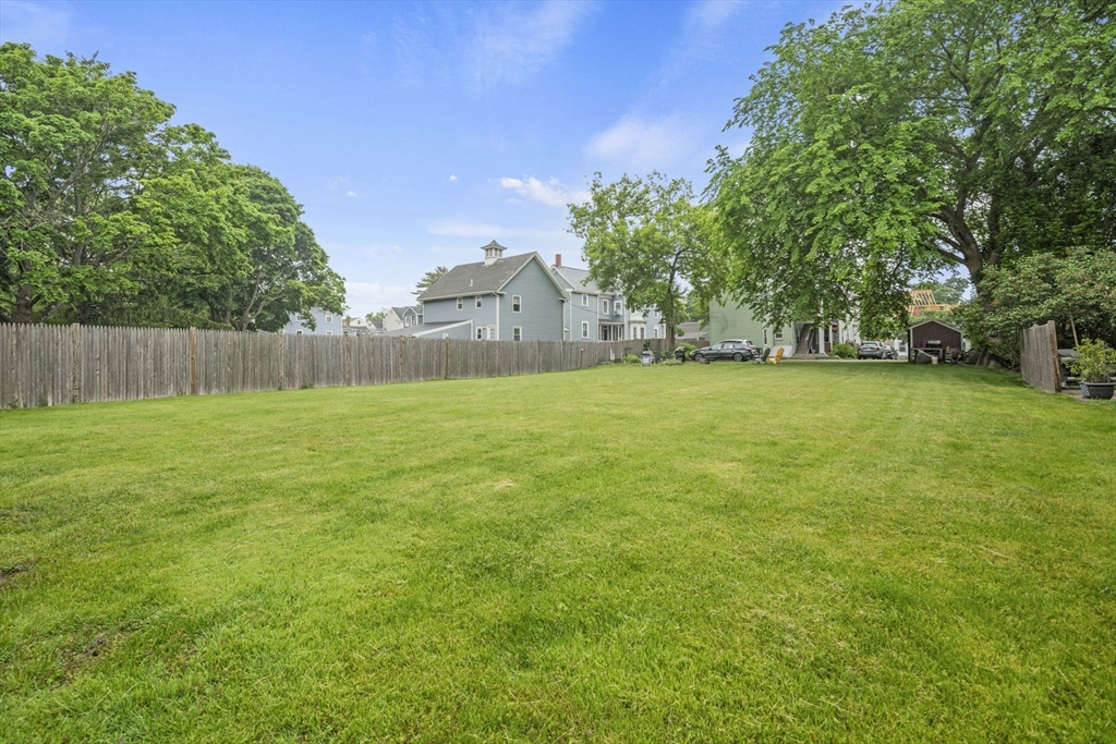 145 High Street, Unit 2 Danvers, MA 01923 - Photo 33 of 40 a view of a field with trees in the background