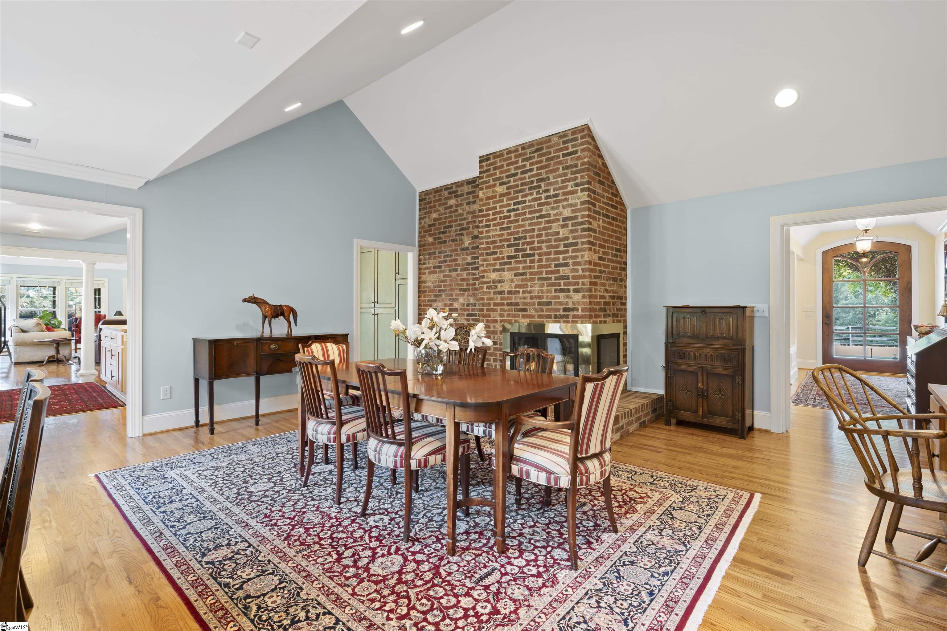 39 Ferguson Road Piedmont, SC 29673 - Photo 8 of 36 Vaulted ceilings, brick gas 2 sided fireplace perfect for entertaining large groups