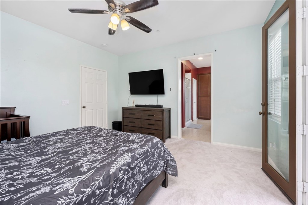 3257 Moss Landing Boulevard Oxnard, CA 93036 - Photo 11 of 29 a bedroom with a bed and a flat screen tv