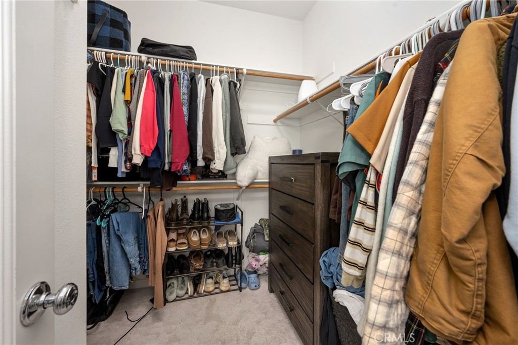 3257 Moss Landing Boulevard Oxnard, CA 93036 - Photo 15 of 29 a view of walk in closet with clothes and shoes