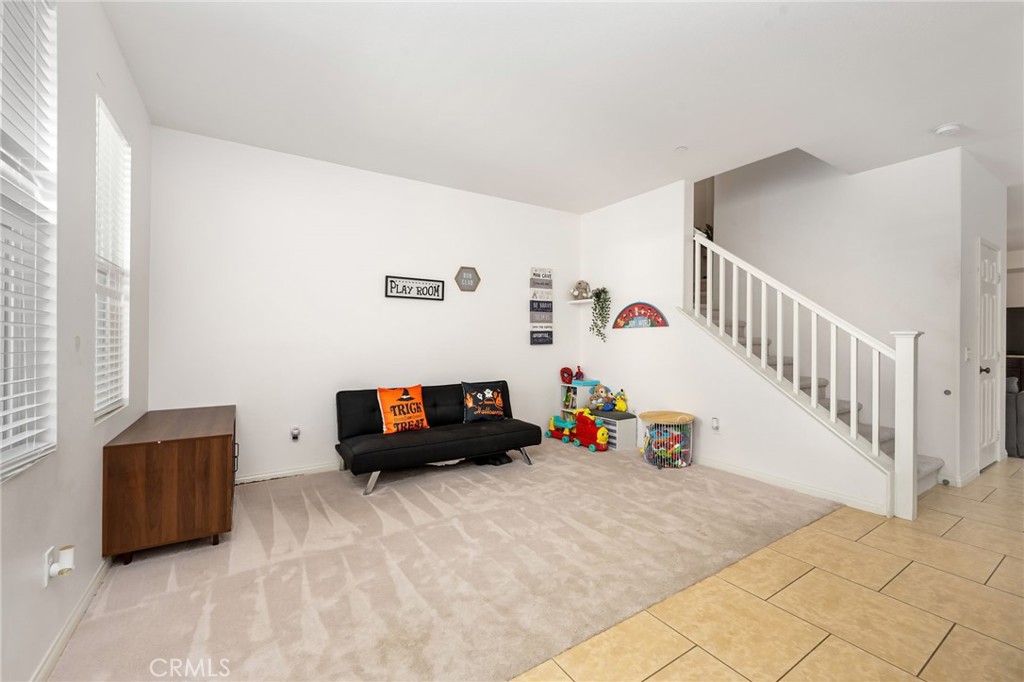 3257 Moss Landing Boulevard Oxnard, CA 93036 - Photo 18 of 29 a living room with furniture and a couch