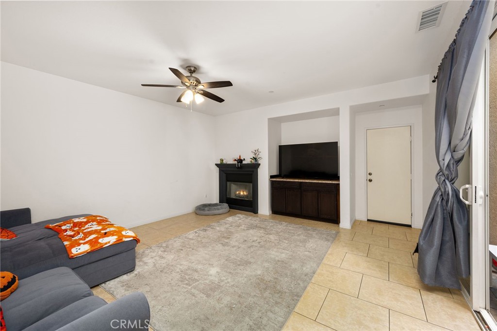 3257 Moss Landing Boulevard Oxnard, CA 93036 - Photo 2 of 29 a living room with furniture and a flat screen tv