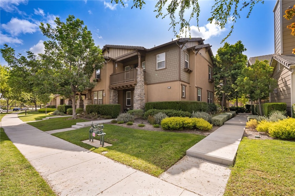 3257 Moss Landing Boulevard Oxnard, CA 93036 - Photo 24 of 29 a front view of a house with garden