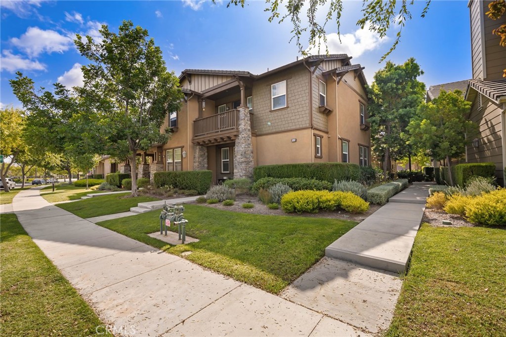 3257 Moss Landing Boulevard Oxnard, CA 93036 - Photo 25 of 29 a front view of a house with garden