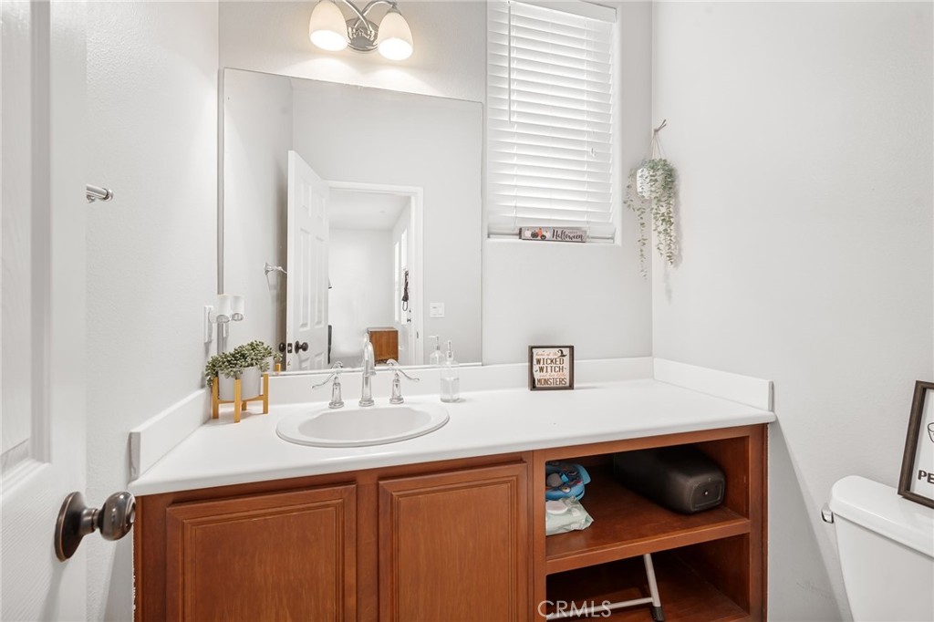 3257 Moss Landing Boulevard Oxnard, CA 93036 - Photo 26 of 29 a bathroom with a sink and a mirror