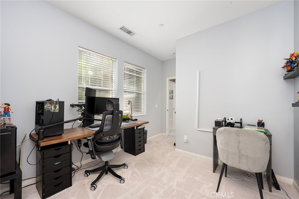 3257 Moss Landing Boulevard Oxnard, CA 93036 - Photo 8 of 29 a view of a workspace with furniture and a window