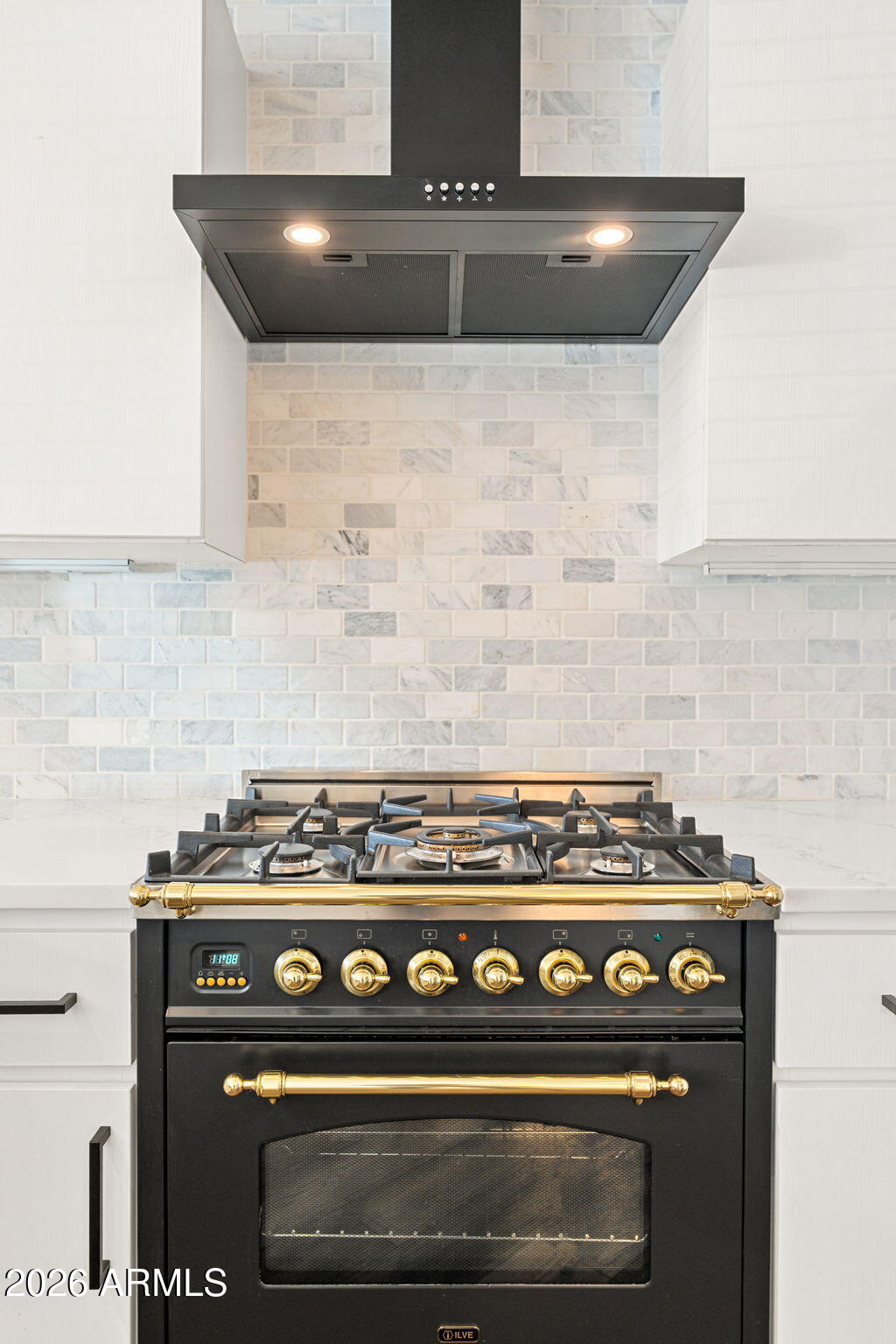 16 West Encanto Boulevard, Unit 12 Phoenix, AZ 85003 - Photo 14 of 42 a stove top oven sitting inside of a kitchen
