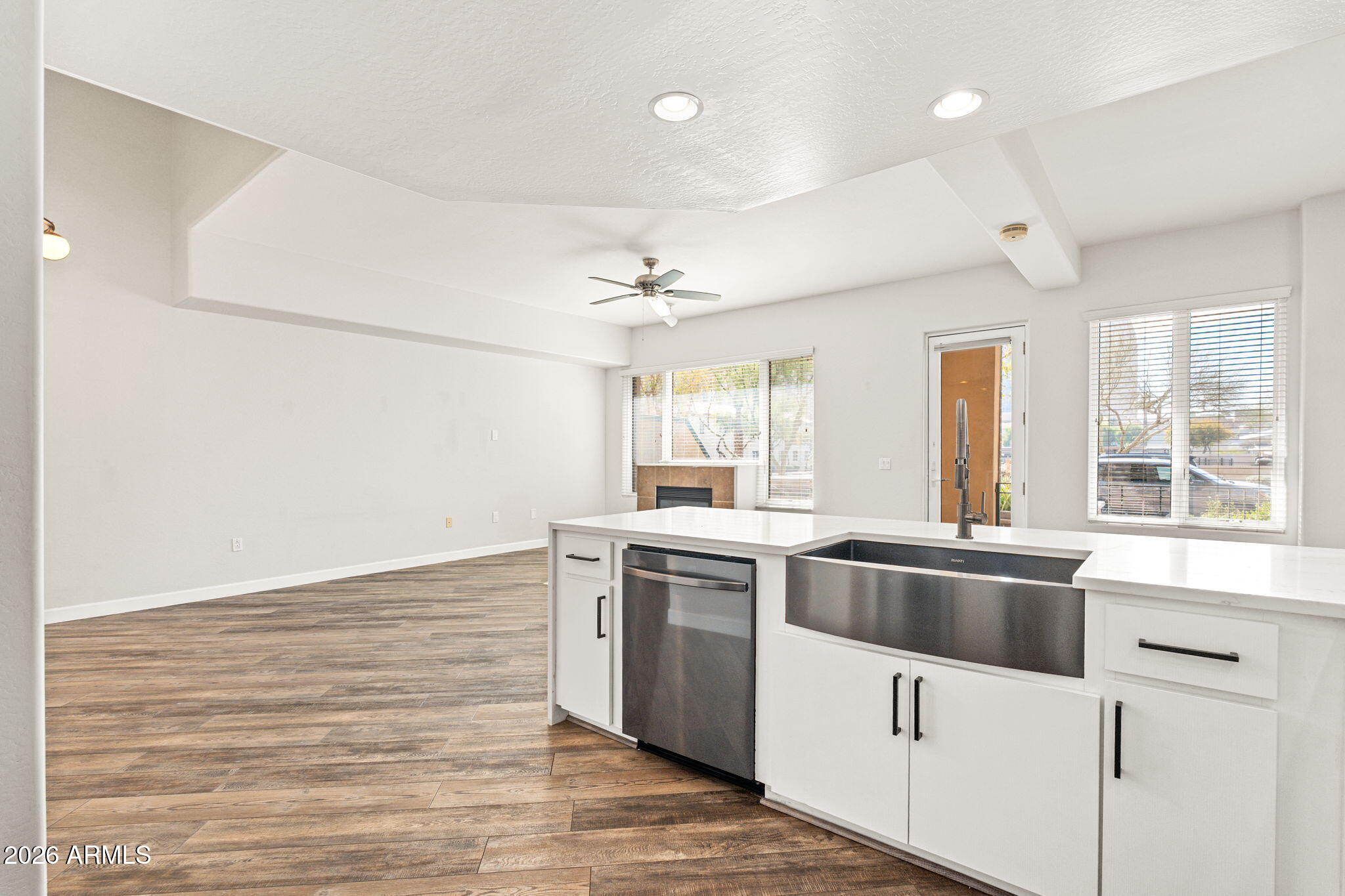 16 West Encanto Boulevard, Unit 12 Phoenix, AZ 85003 - Photo 15 of 42 a kitchen with stainless steel appliances granite countertop a stove and a sink