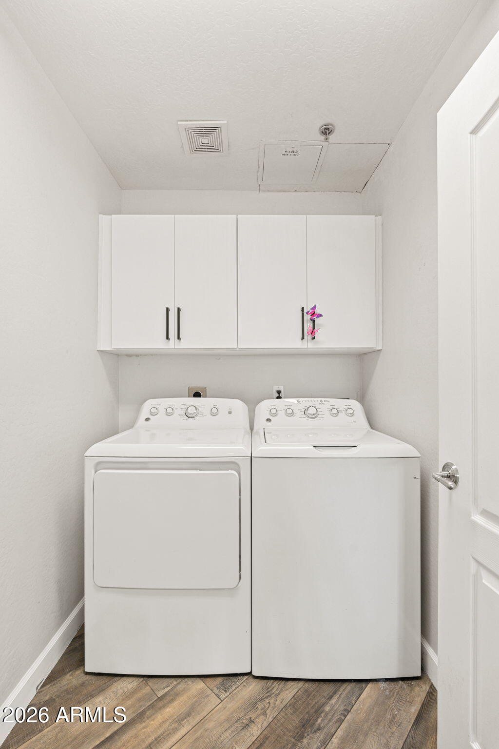 16 West Encanto Boulevard, Unit 12 Phoenix, AZ 85003 - Photo 16 of 42 a utility room with dryer and washer