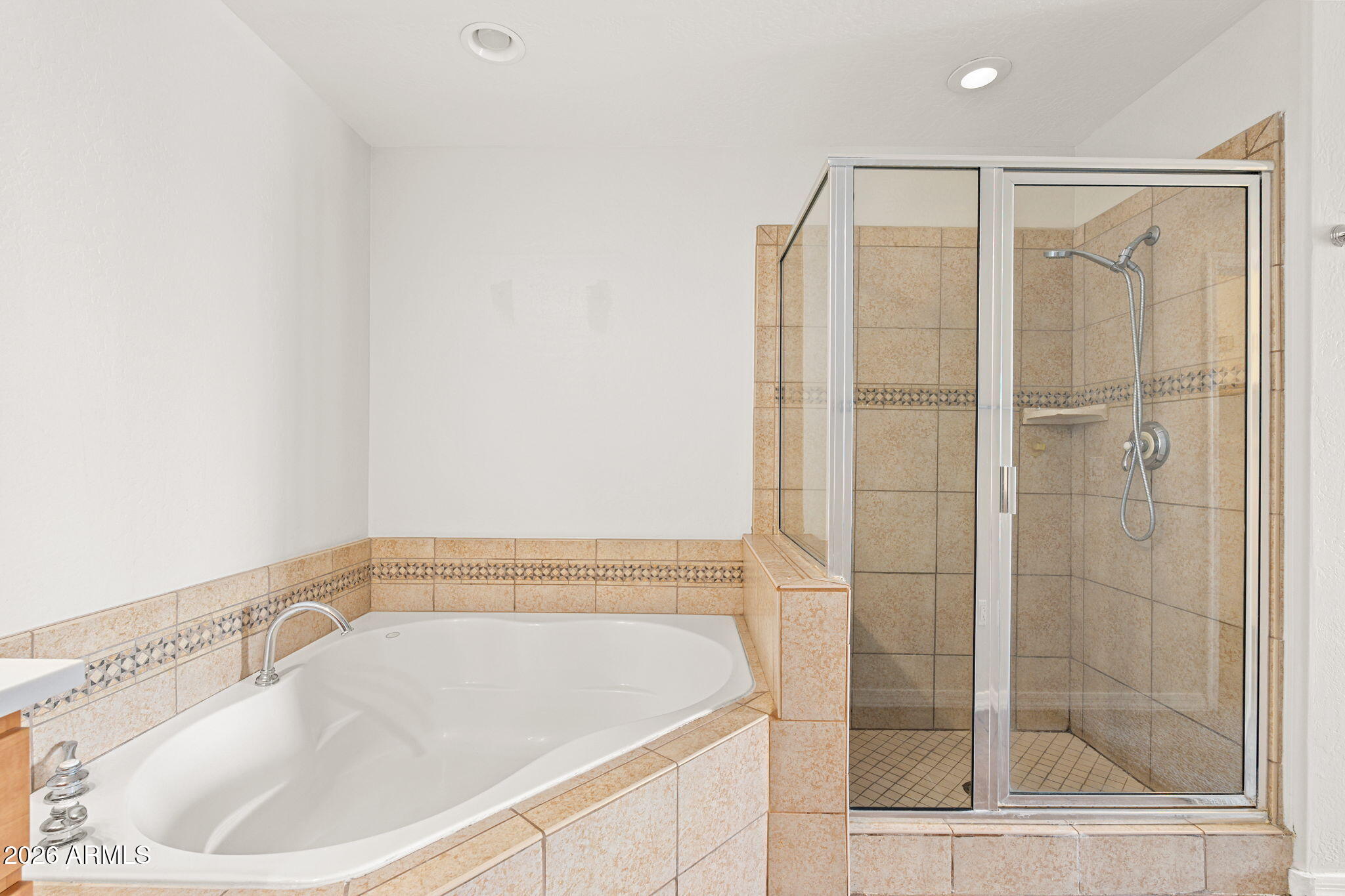 16 West Encanto Boulevard, Unit 12 Phoenix, AZ 85003 - Photo 23 of 42 a bathroom with a bathtub and a shower