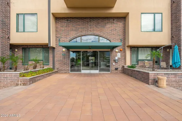 a view of pool with outdoor seating