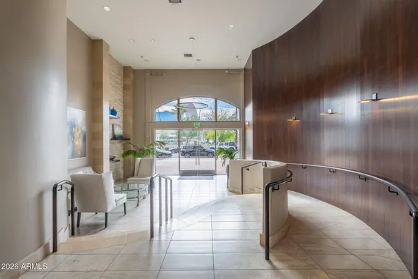 a view of a living room and entryway