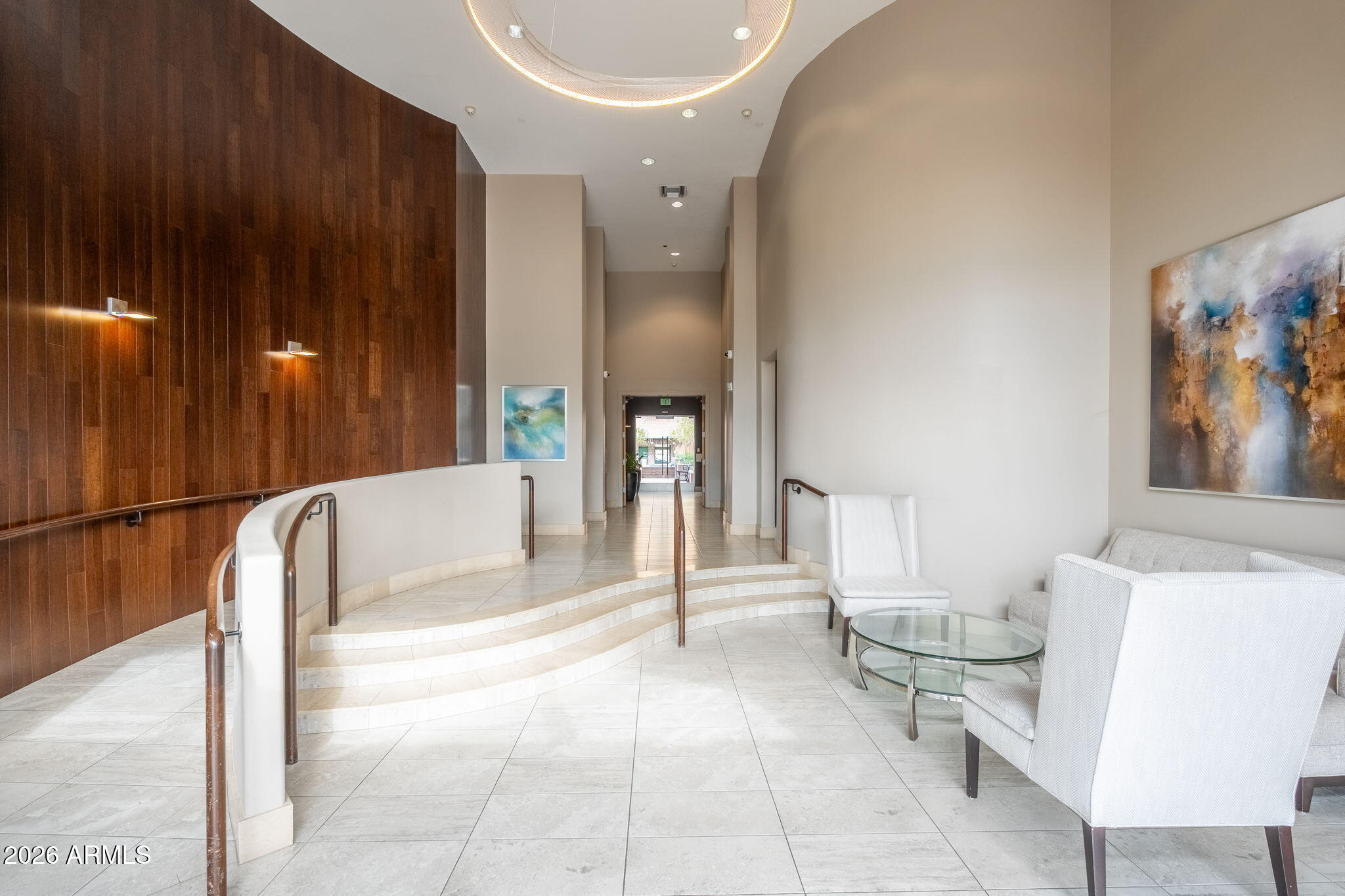 16 West Encanto Boulevard, Unit 12 Phoenix, AZ 85003 - Photo 33 of 42 a living room with furniture and a painting