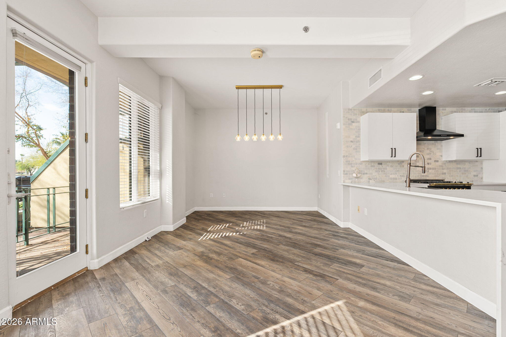 16 West Encanto Boulevard, Unit 12 Phoenix, AZ 85003 - Photo 8 of 42 a view of a kitchen with windows