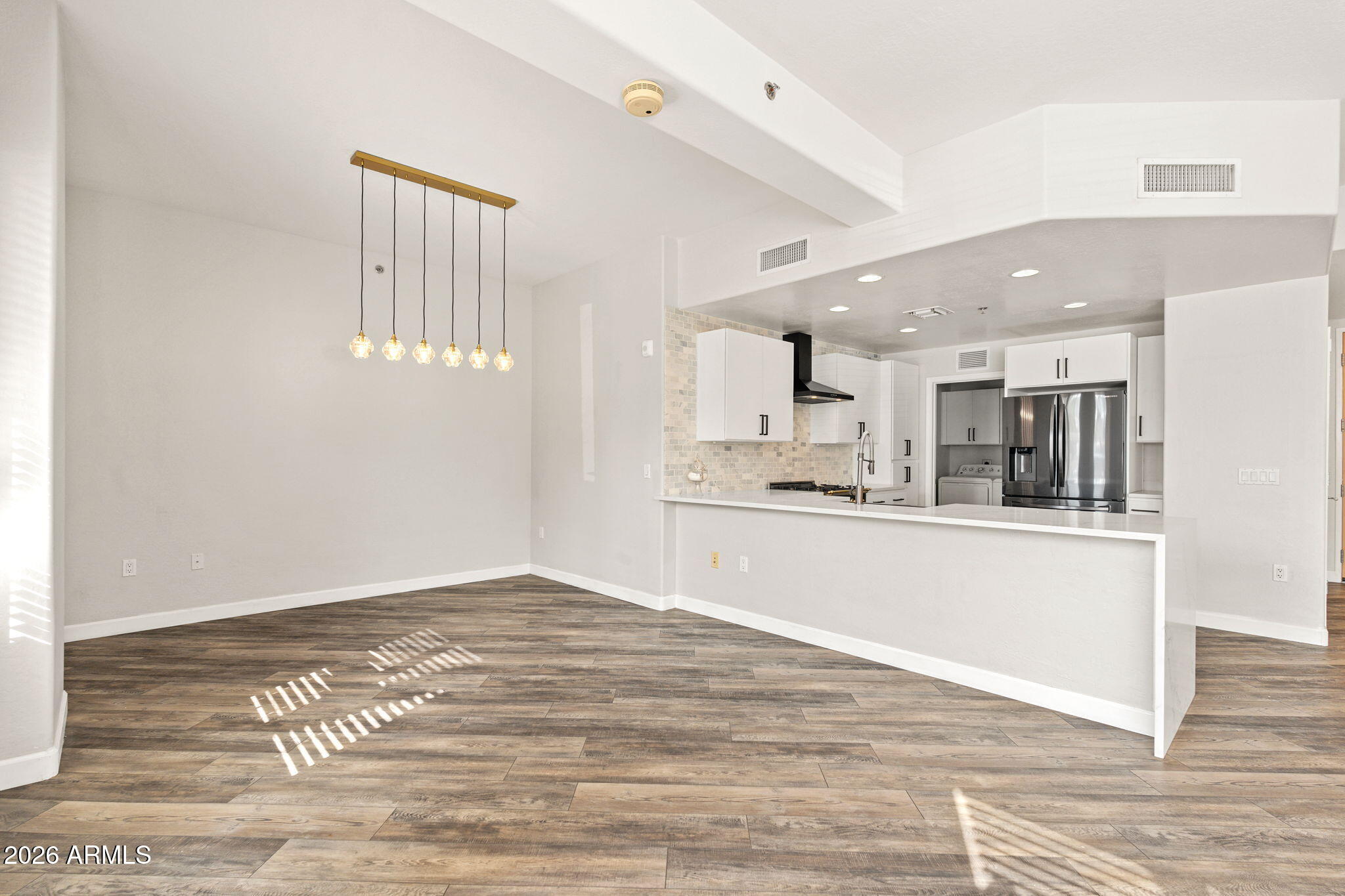 16 West Encanto Boulevard, Unit 12 Phoenix, AZ 85003 - Photo 9 of 42 a view of kitchen with wooden floor