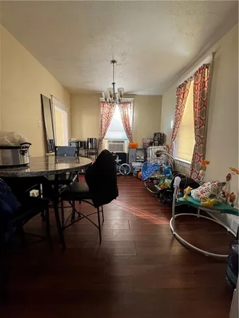 a room with furniture and a window