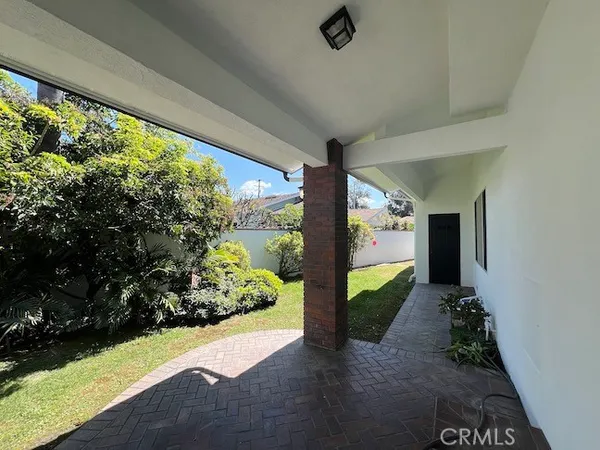 a view of a back yard of the house