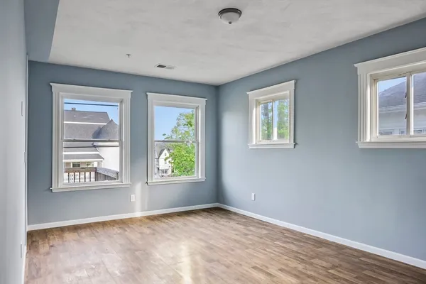 an empty room with windows