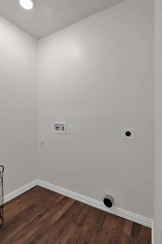 a view of small space with wooden floor