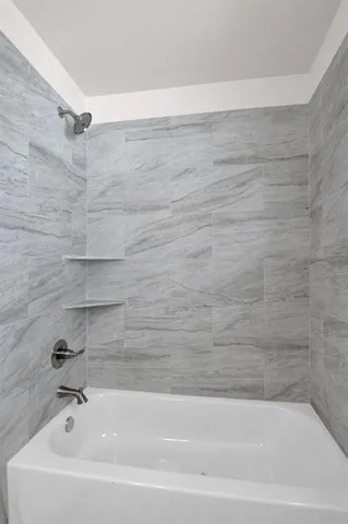 a bathroom with a bathtub