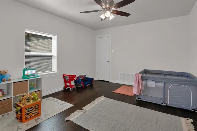 a living room with furniture and window