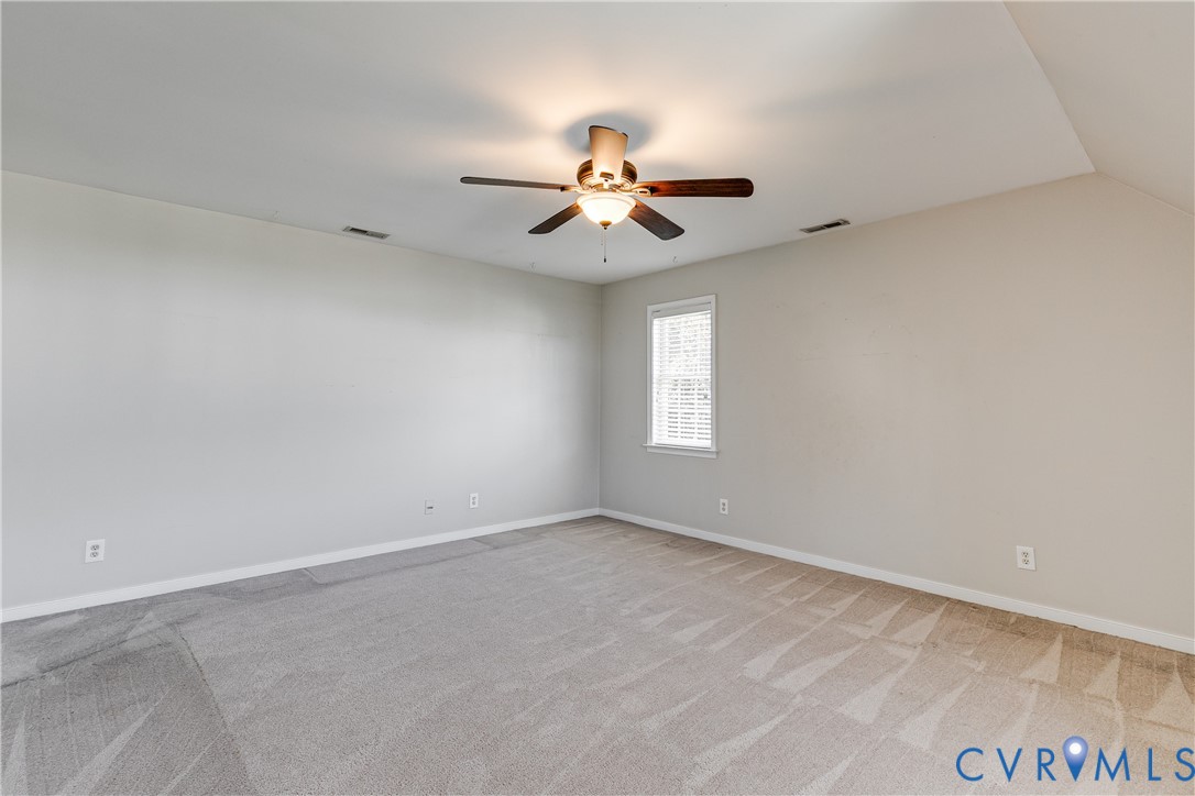 4318 Rose Glen Place Midlothian, VA 23015 - Photo 21 of 33 an empty room with windows and fan