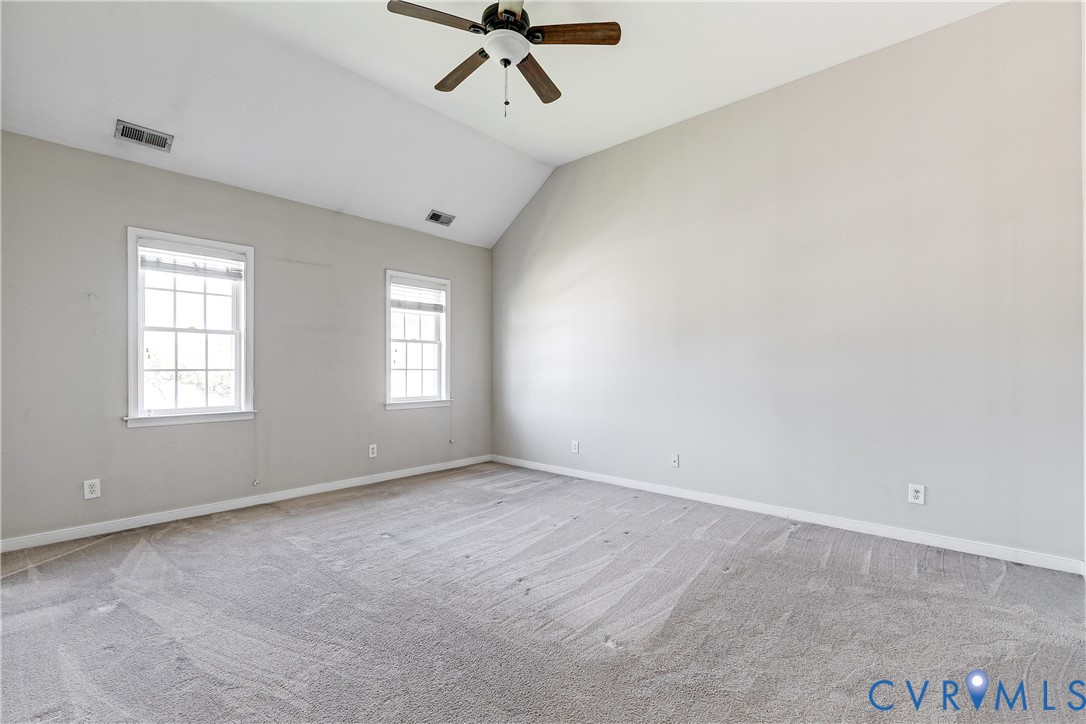 4318 Rose Glen Place Midlothian, VA 23015 - Photo 27 of 33 an empty room with windows and fan