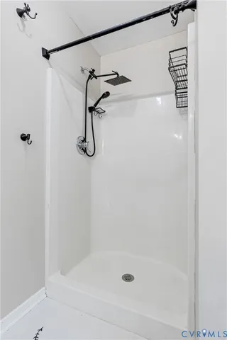 a bathroom with a bath tub