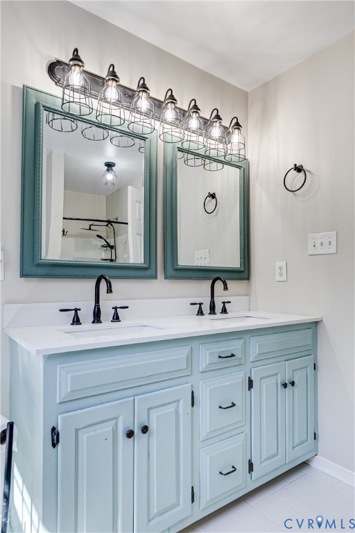 4318 Rose Glen Place Midlothian, VA 23015 - Photo 33 of 33 a bathroom with double vanity sinks and a mirror