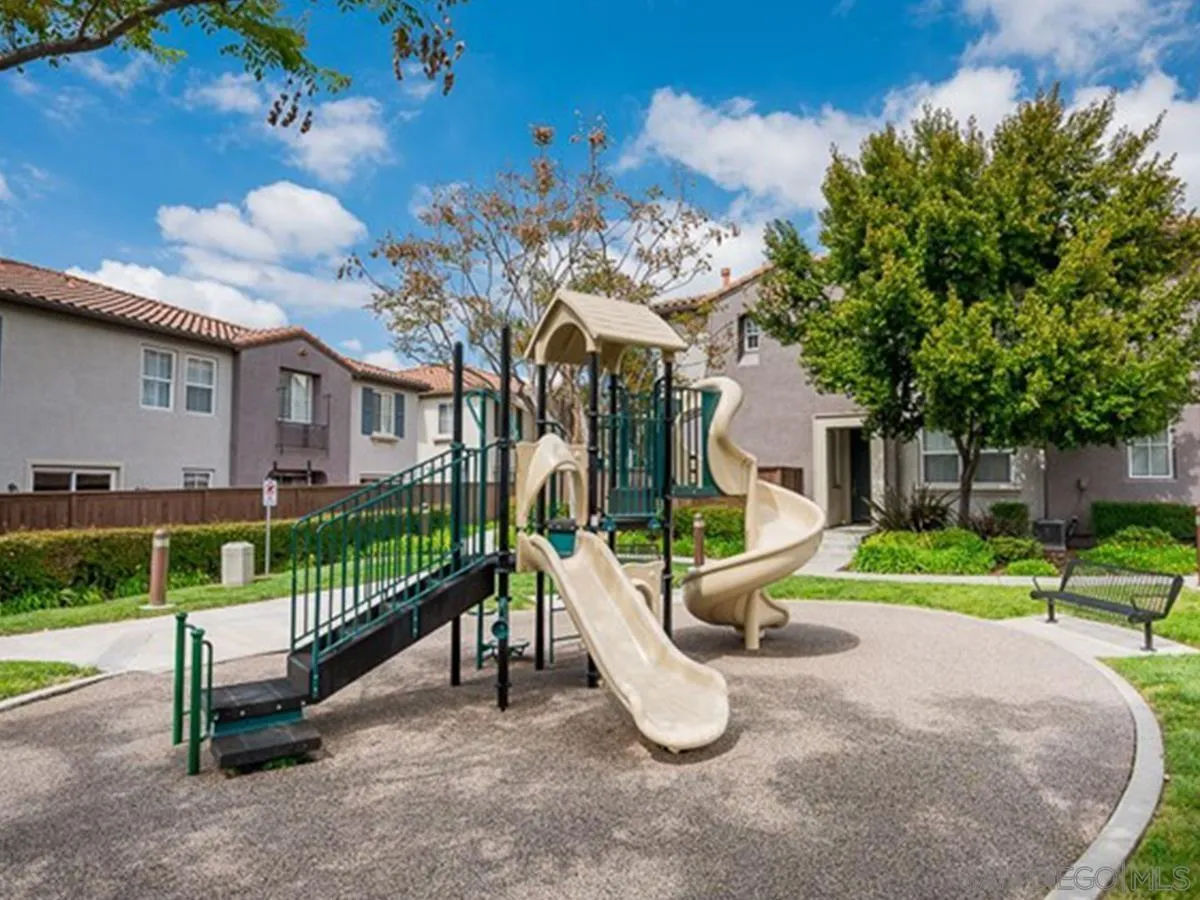 2732 Crown Ridge Road, Unit 1 Chula Vista, CA 91915 - Photo 32 of 32 a view of a house with a yard and a garden