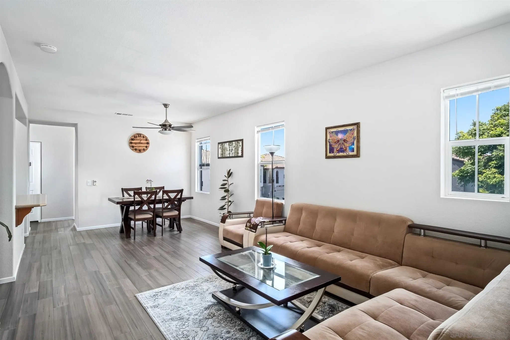 2732 Crown Ridge Road, Unit 1 Chula Vista, CA 91915 - Photo 6 of 32 a living room with furniture and wooden floor