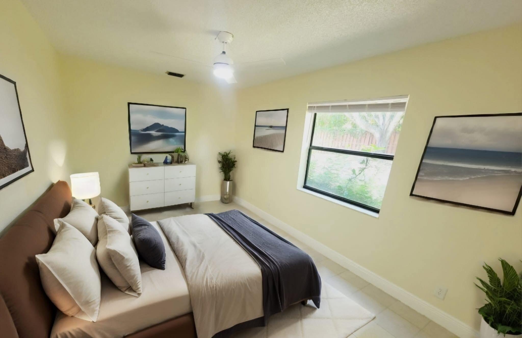 2 Crossings Circle, Unit B Boynton Beach, FL 33435 - Photo 11 of 12 a bedroom with a bed and cupboard