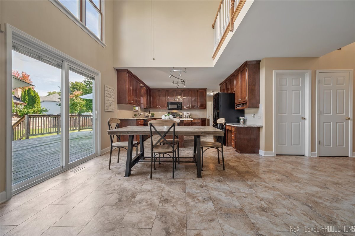 473 Bond Drive Batavia, IL 60510 - Photo 15 of 39 a view of a dining room with furniture window and outside view