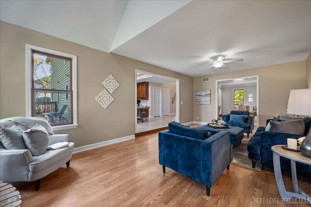 473 Bond Drive Batavia, IL 60510 - Photo 16 of 39 a living room with furniture rug and window